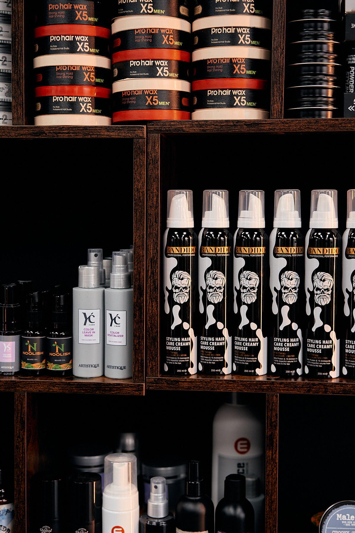 Premium grooming products on the shelves at Empire Barbershop